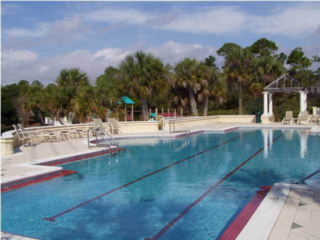 4595 Sailmaker Lane Destin, FL 32541 - Photo 13 of 14 a view of a swimming pool with an outdoor space and seating area