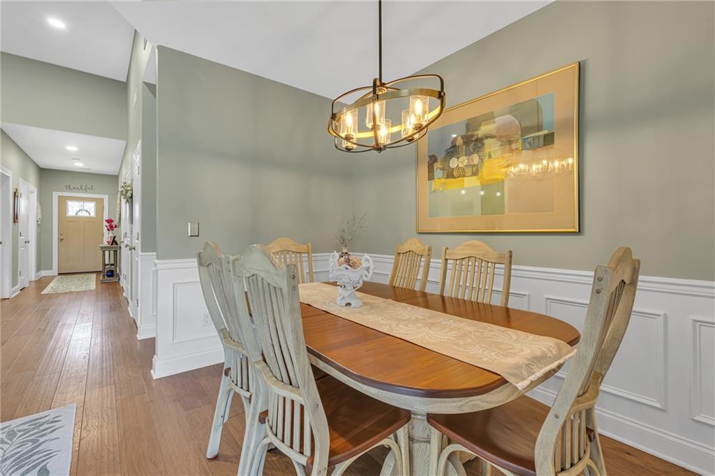 16 Pinehurst Place Beaver, PA 15009 - Photo 12 of 34 a view of a dining room with furniture wooden floor and chandelier