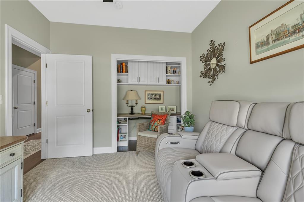 16 Pinehurst Place Beaver, PA 15009 - Photo 20 of 34 a living room with furniture and a baby crib