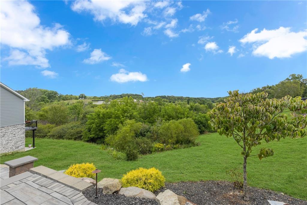 16 Pinehurst Place Beaver, PA 15009 - Photo 28 of 34 a view of a grassy field with trees in the background