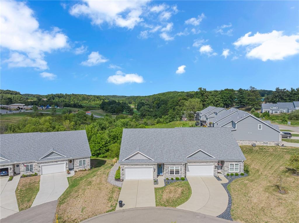 16 Pinehurst Place Beaver, PA 15009 - Photo 30 of 34 an aerial view of a house with yard and mountain view in back