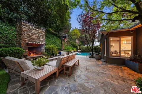 a view of a house with swimming pool