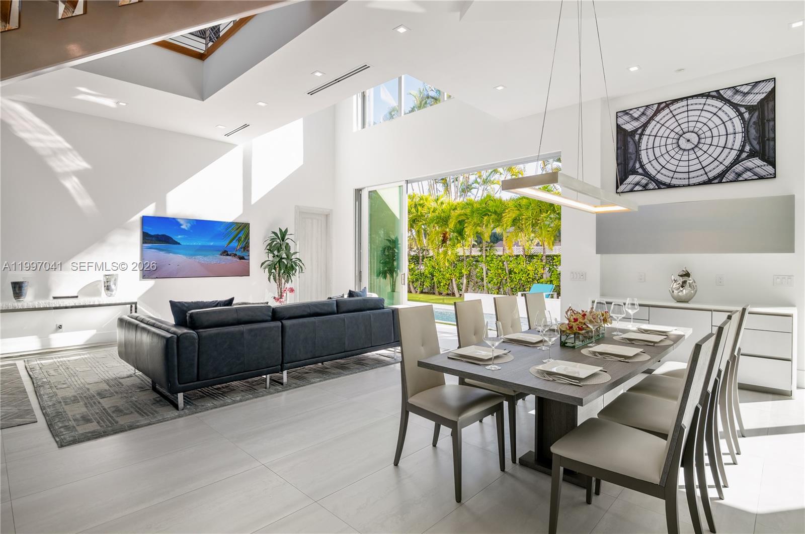 2628 Marcinski Road Jupiter, FL 33477 - Photo 17 of 50 a living room with furniture and a large window