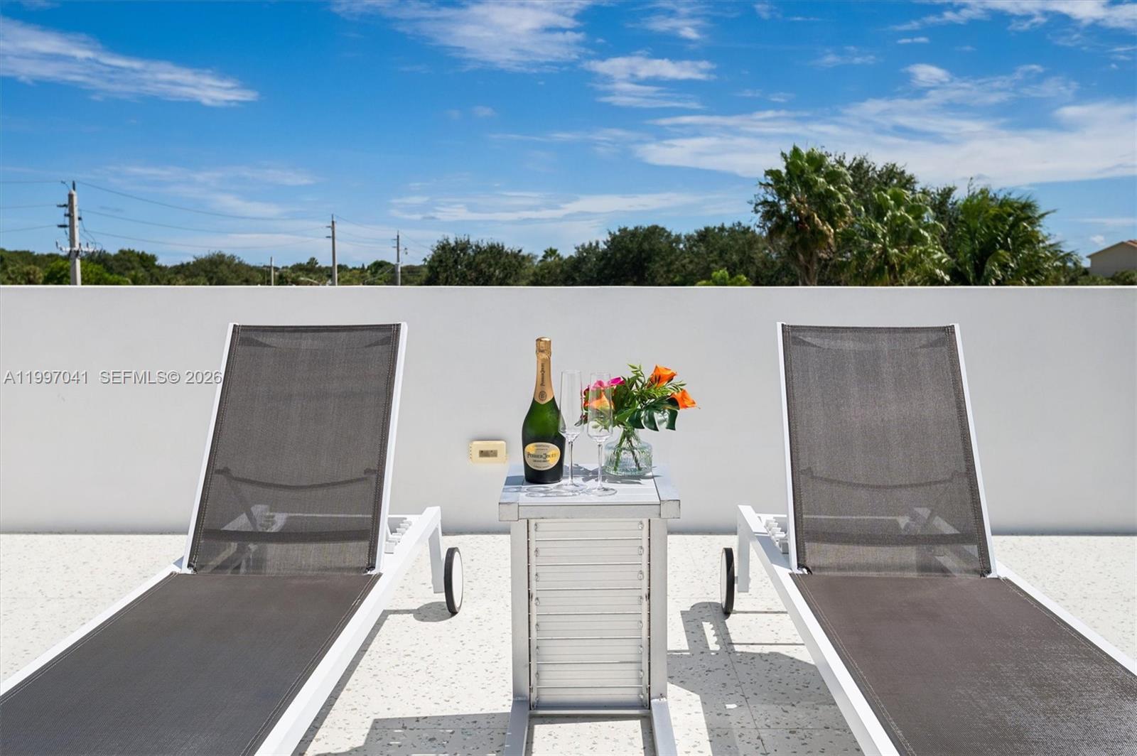 2628 Marcinski Road Jupiter, FL 33477 - Photo 41 of 50 a view of an outdoor space and seating