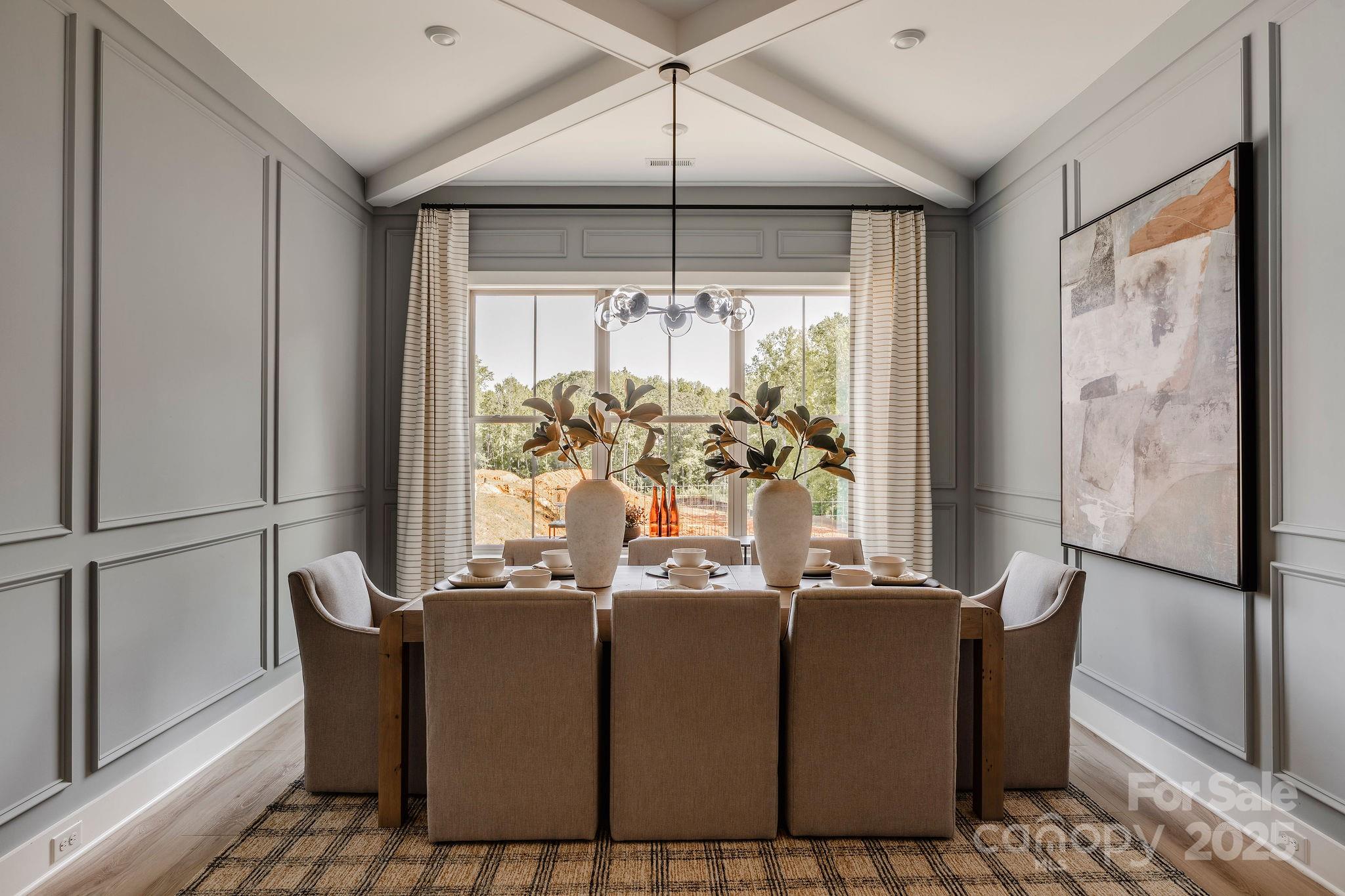 14 Huntersville-Concord Road, Unit COVINGTON Huntersville, NC 28078 - Photo 6 of 13 a view of a dining room with furniture window and outside view