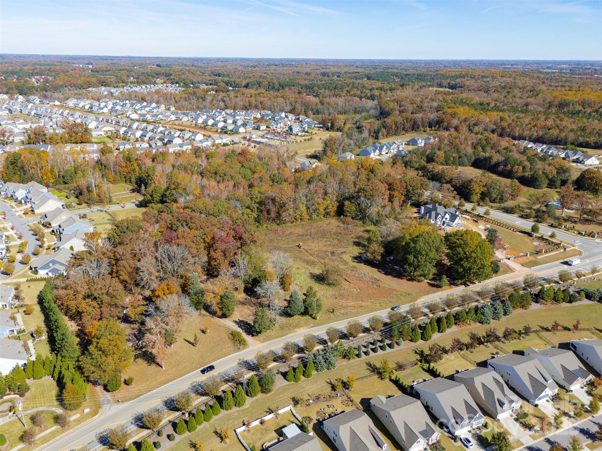 14 Huntersville-Concord Road, Unit COVINGTON Huntersville, NC 28078 - Photo 10 of 13 an aerial view of residential building and lake view