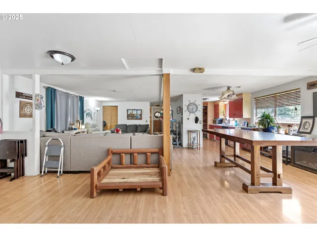 a bedroom with furniture and a window