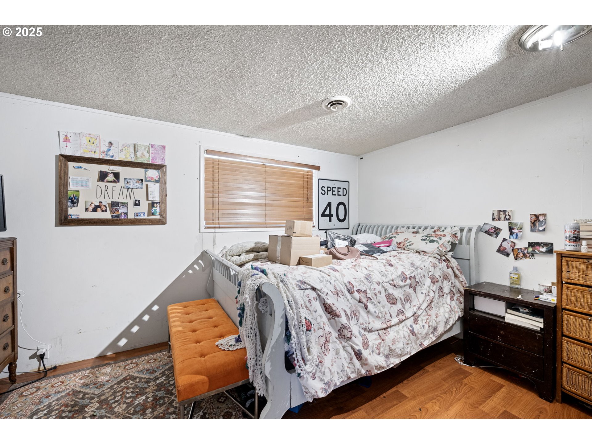 89731 Indian Creek Road Swisshome, OR 97480 - Photo 29 of 46 a bed room with a bed window and dresser