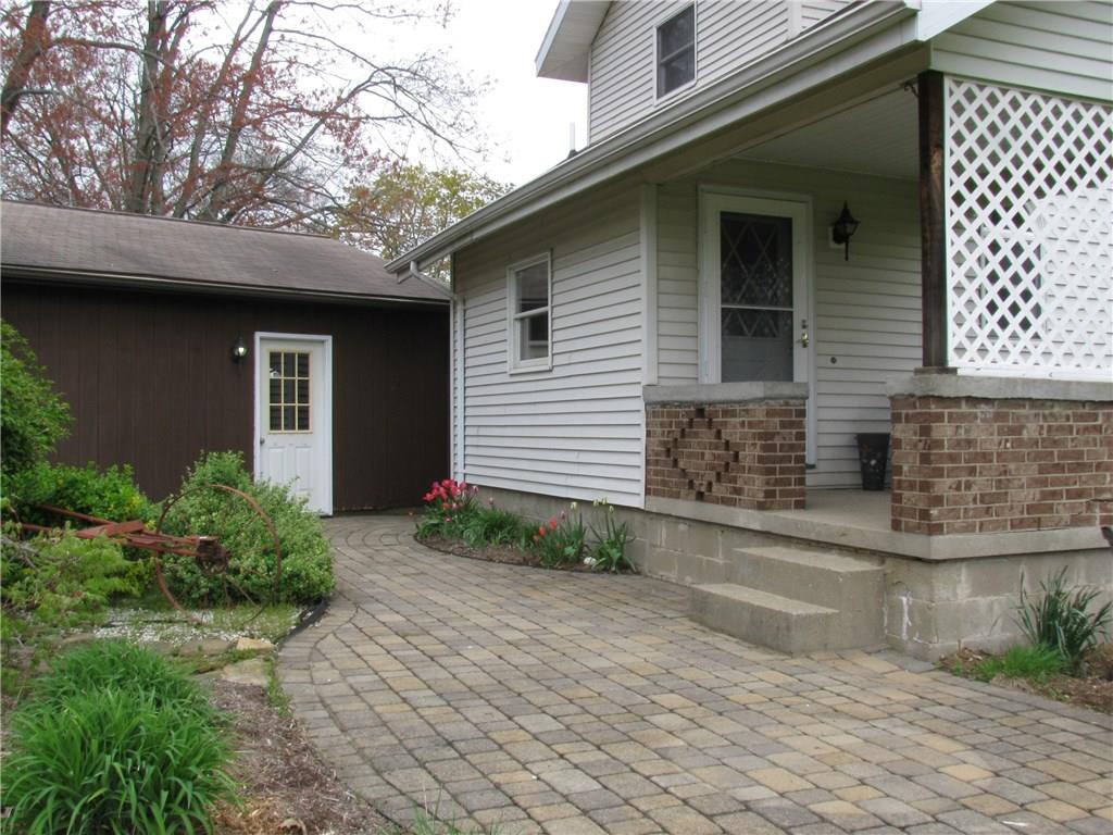 783 Mercer Road Greenville, PA 16125 - Photo 4 of 25 Newer brick sidewalk from garage to rear entry door.