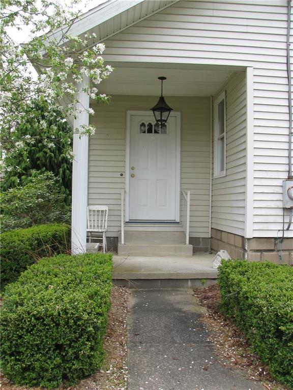783 Mercer Road Greenville, PA 16125 - Photo 5 of 25 Side entry walks into front enclosed porch. Could be an office.