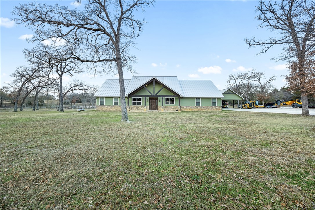 7440 Fm 39 Road South North Zulch, TX 77872 - Photo 2 of 50 a view of a house with yard and green space