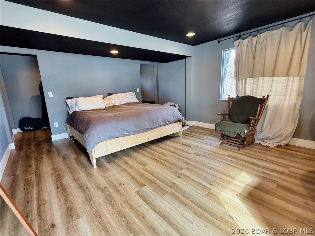 876 Malibu Road Osage Beach, MO 65065 - Photo 1 of 37 The whole downstairs is the primary suite, great s