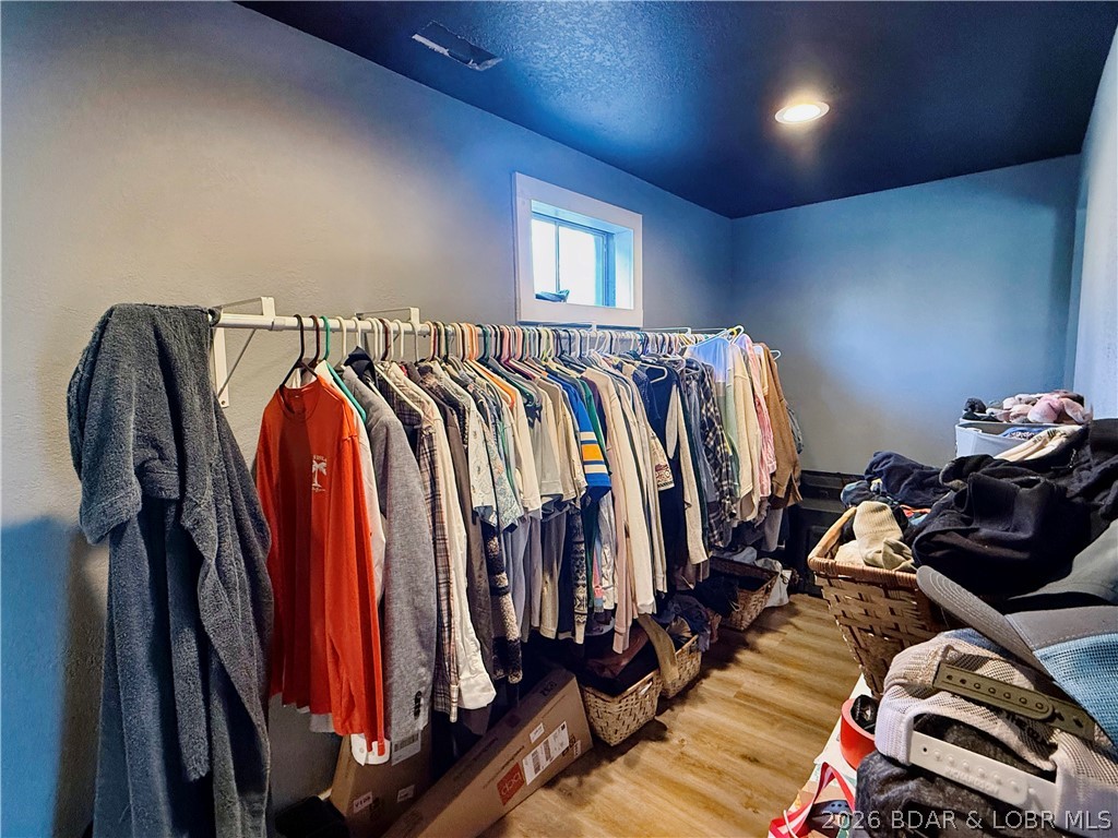 876 Malibu Road Osage Beach, MO 65065 - Photo 8 of 37 Walk in closet in the primary suite
