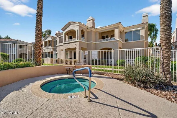 a view of a house with a swimming pool