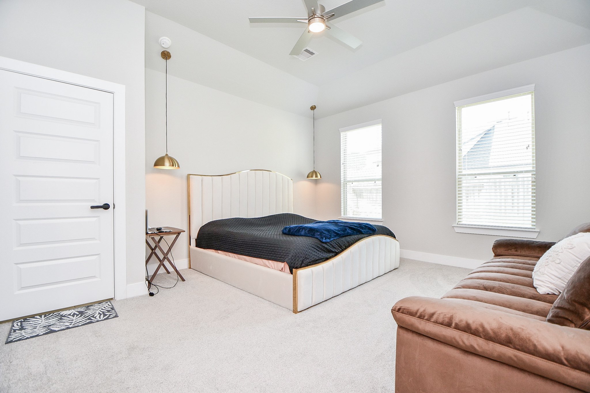 3430 Majestic Pine Lane Rosenberg, TX 77471 - Photo 12 of 32 a bedroom with a bed couch and window