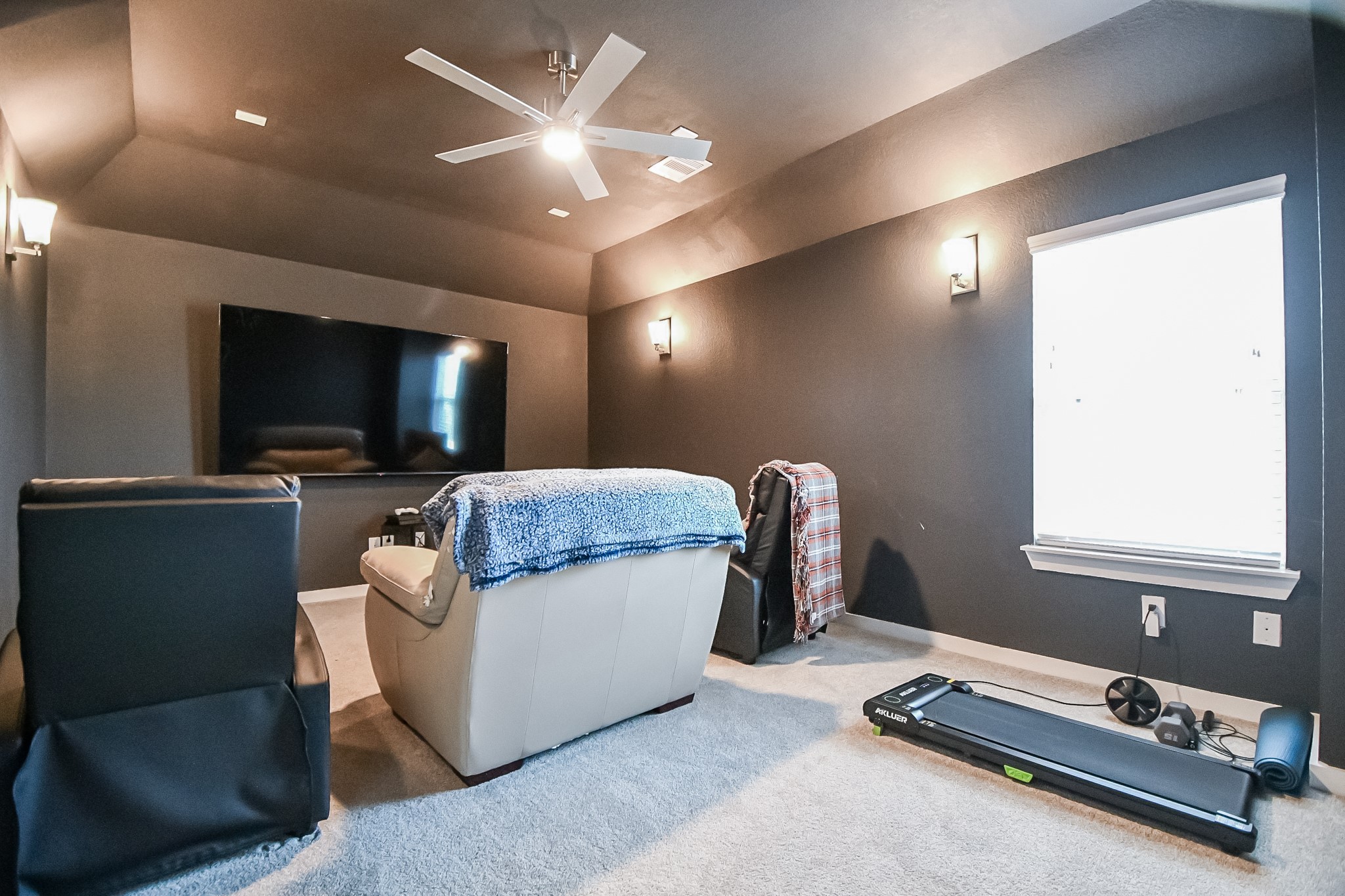 3430 Majestic Pine Lane Rosenberg, TX 77471 - Photo 19 of 32 a living room with furniture and a flat screen tv