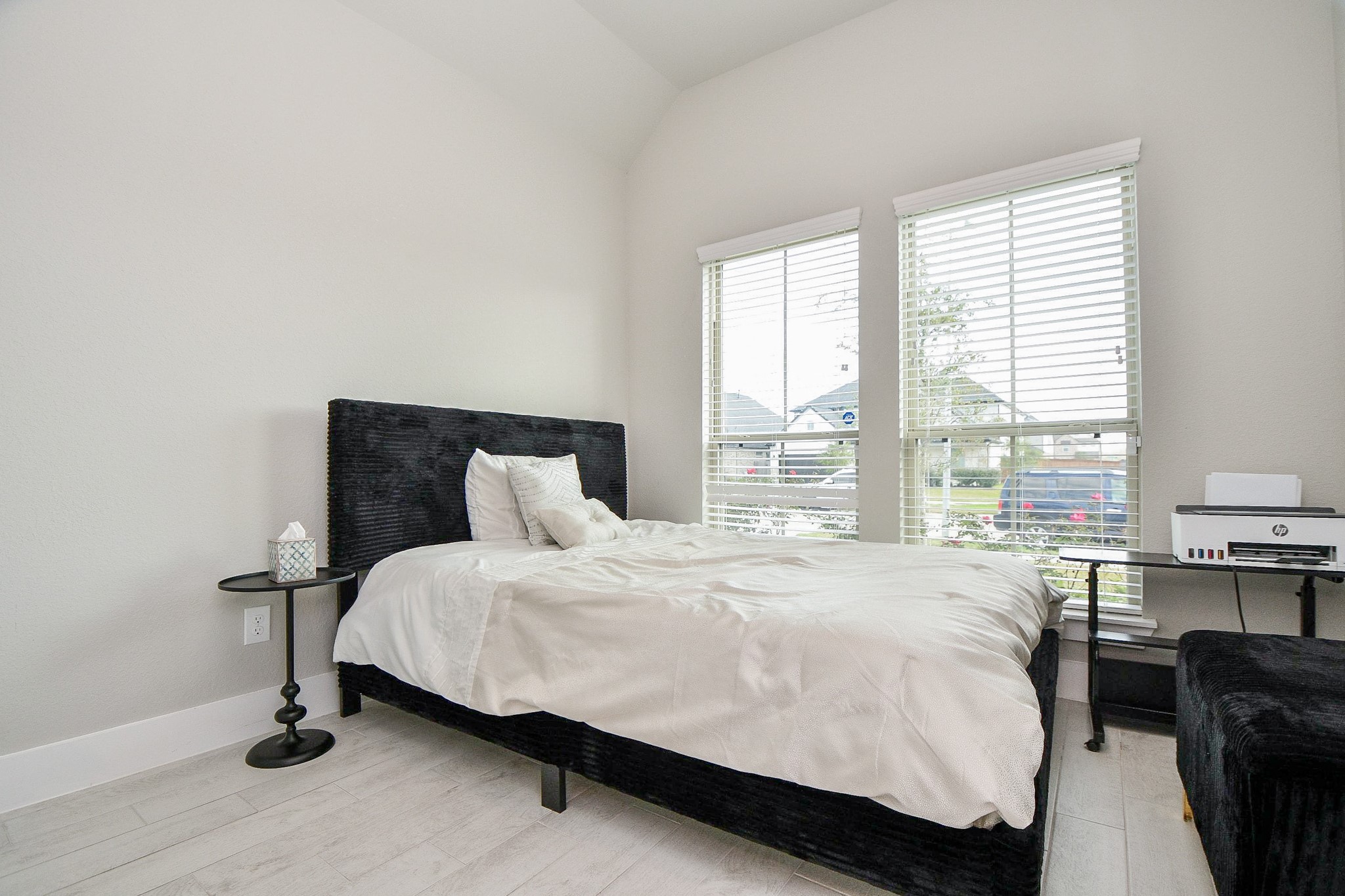 3430 Majestic Pine Lane Rosenberg, TX 77471 - Photo 23 of 32 a bedroom with a bed chair and a window