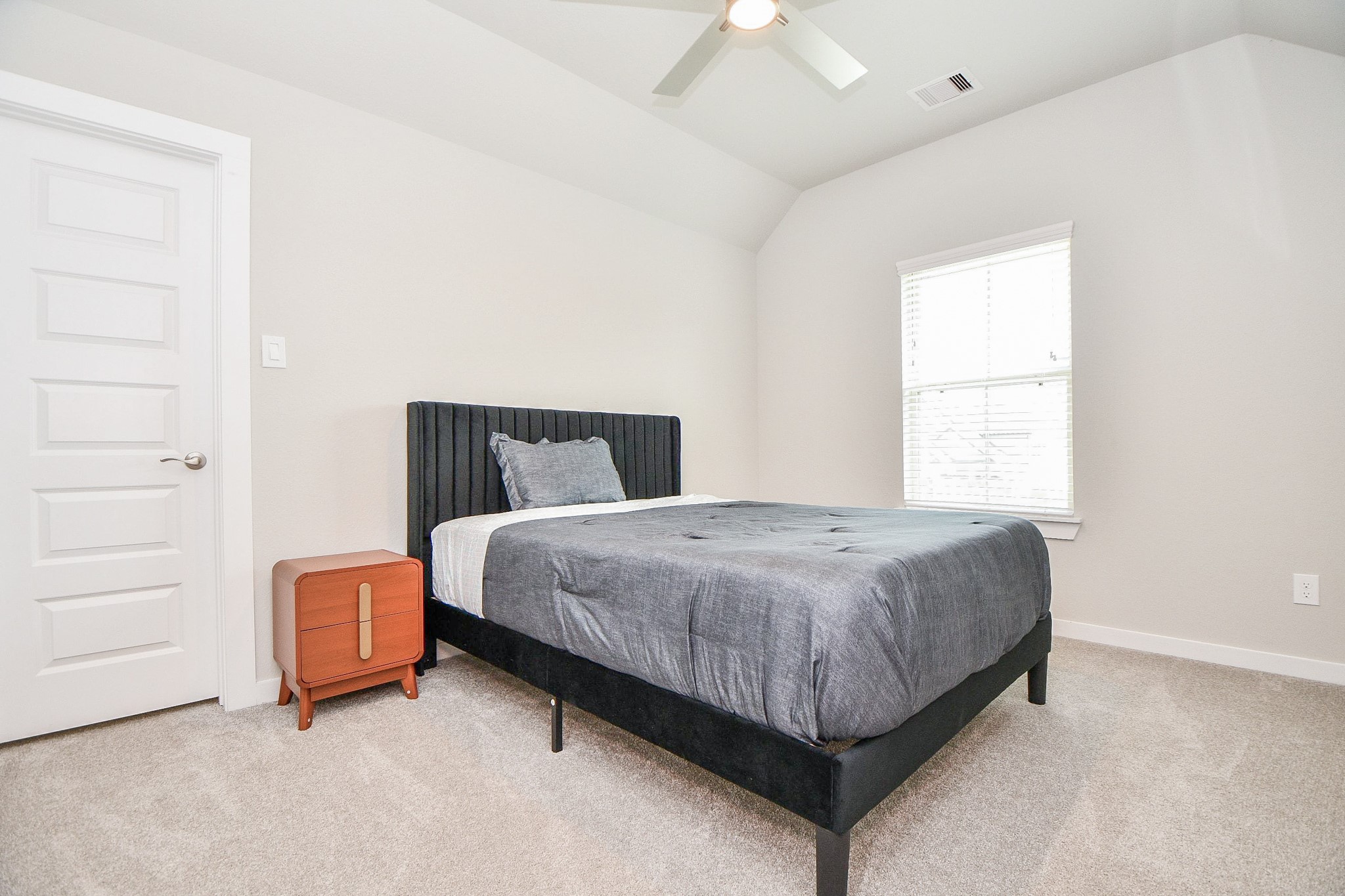 3430 Majestic Pine Lane Rosenberg, TX 77471 - Photo 24 of 32 a bedroom with a bed and window