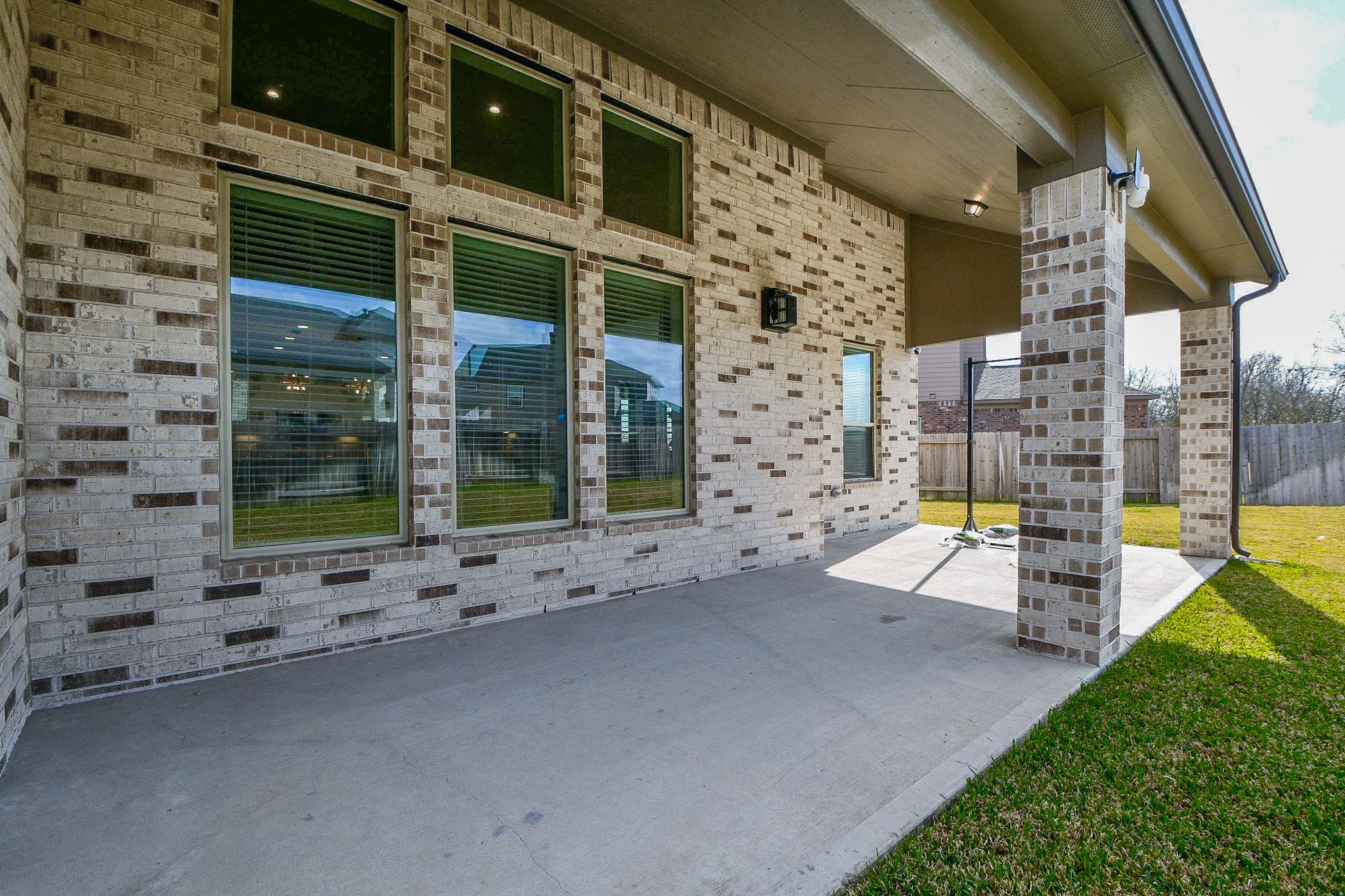 3430 Majestic Pine Lane Rosenberg, TX 77471 - Photo 31 of 32 a view of a house with backyard porch and sitting area