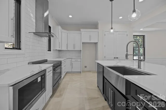 a view of kitchen with wooden floor