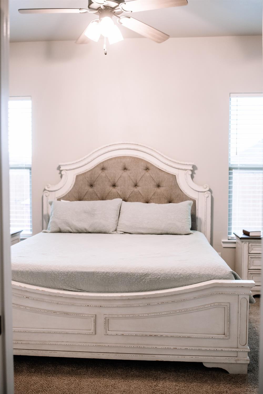 3224 Virginia Avenue Lubbock, TX 79407 - Photo 25 of 39 a spacious bedroom with a bed and window