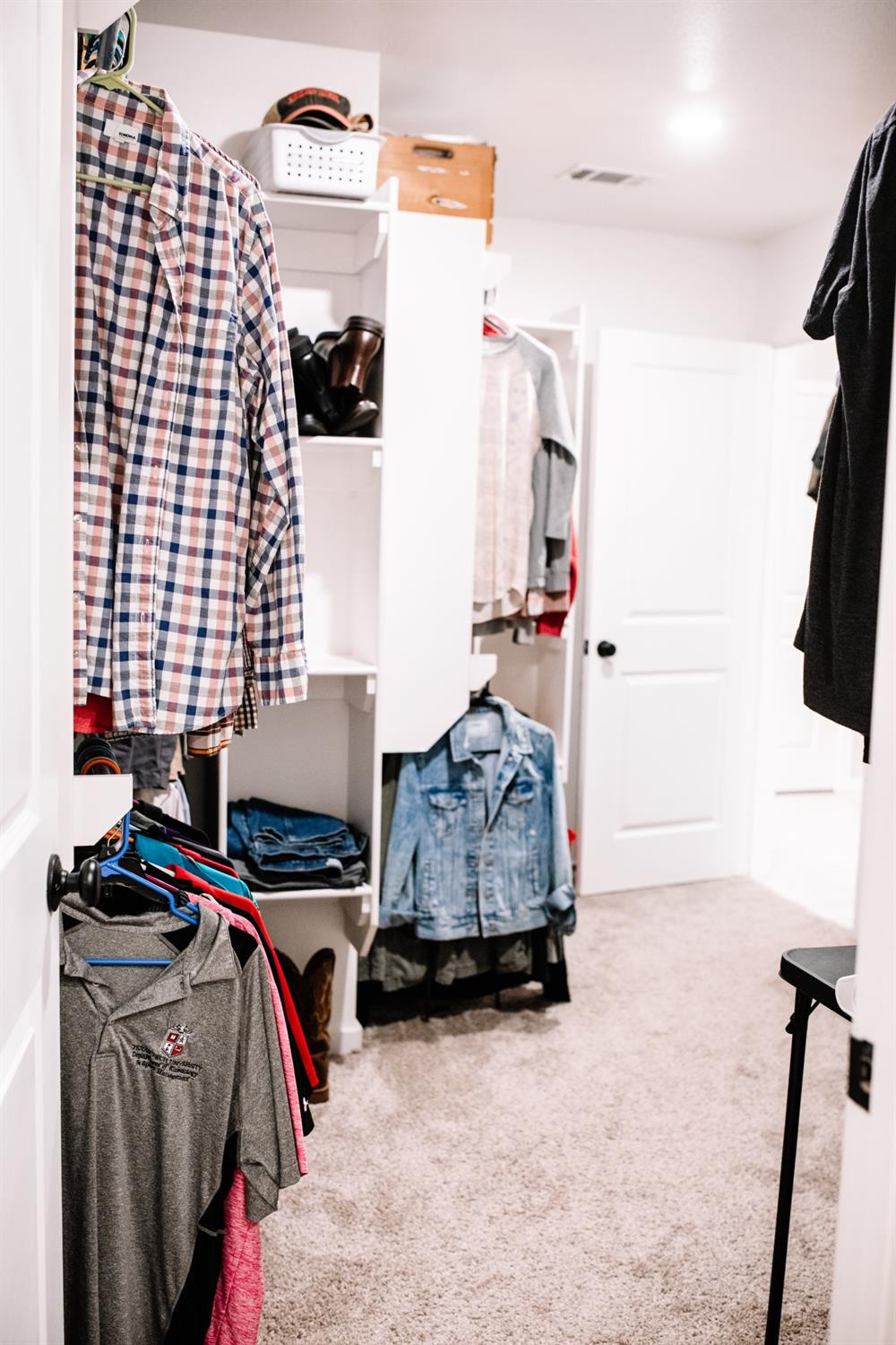 3224 Virginia Avenue Lubbock, TX 79407 - Photo 31 of 39 a view of walk in closet with clothes and shoes