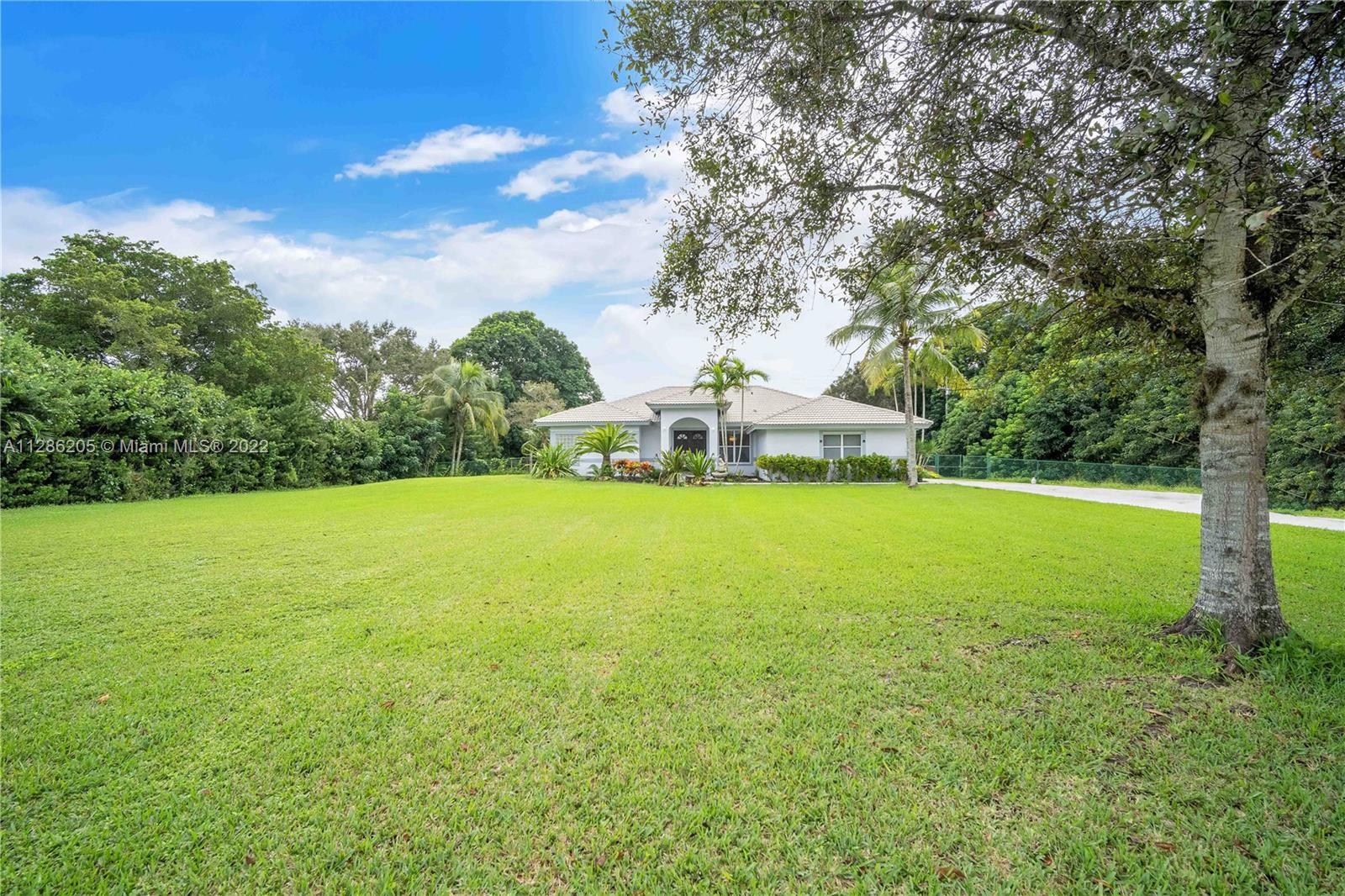 17880 Southwest 66th Street Southwest Ranches, FL 33331 - Photo 46 of 57 a view of a field with of trees
