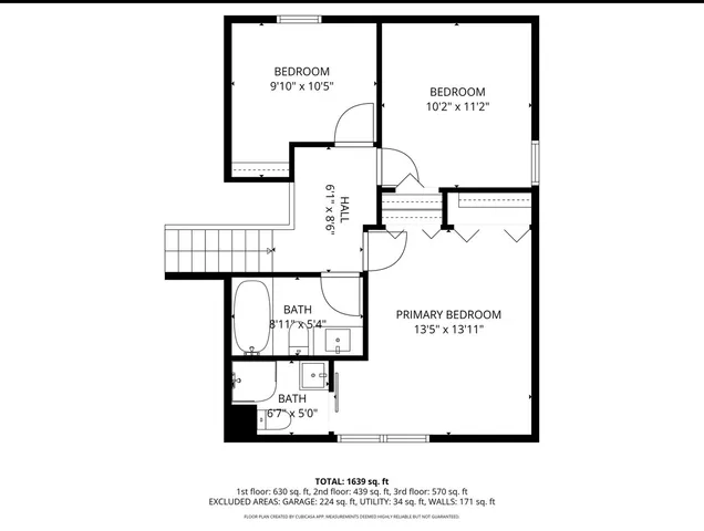 a black and white photo of a living room