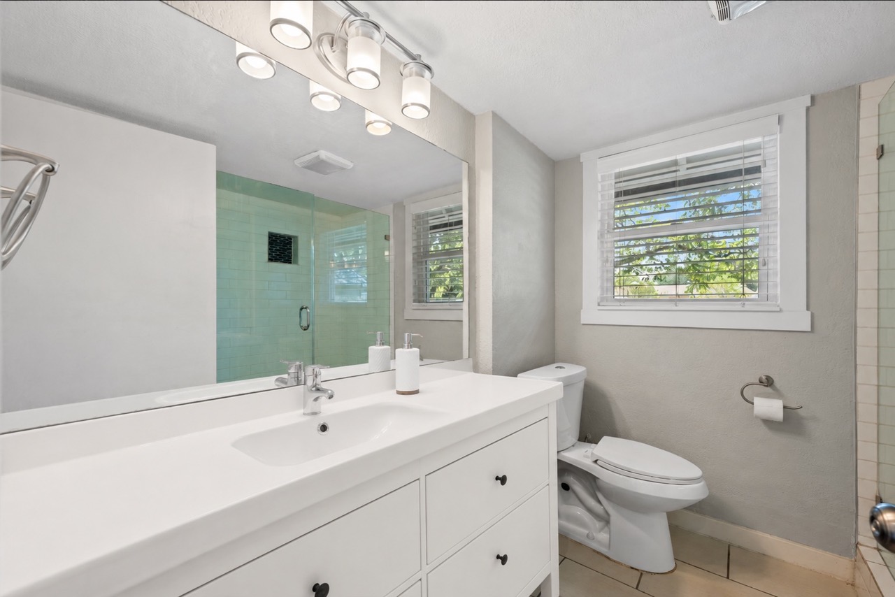 1801 Ohlen Road Austin, TX 78757 - Photo 17 of 32 AI rendered downstairs bathroom photo to show potential.