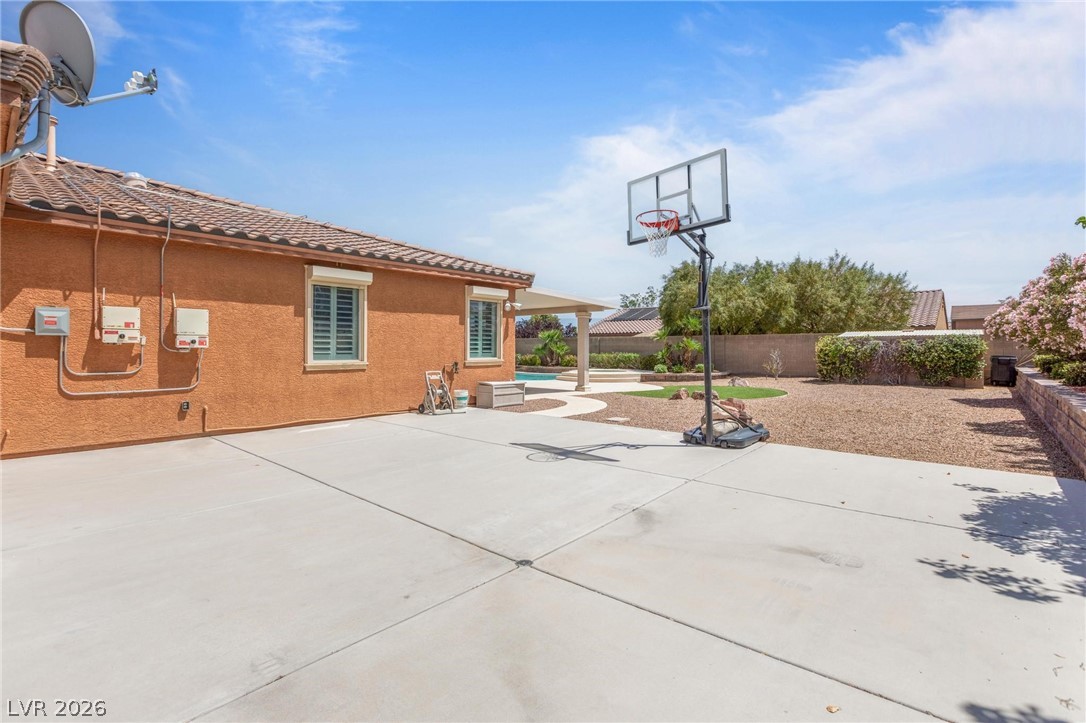 8431 Durango Ranch Court Las Vegas, NV 89113 - Photo 41 of 49 This spacious backyard offers a private pool, patio, and ample room for recreation.