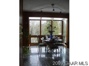 137 Raintree Road Verona, VA 24482 - Photo 3 of 12 a view of a dining room with furniture window and outside view