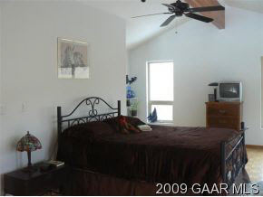 137 Raintree Road Verona, VA 24482 - Photo 9 of 12 a bedroom with a bed and a window
