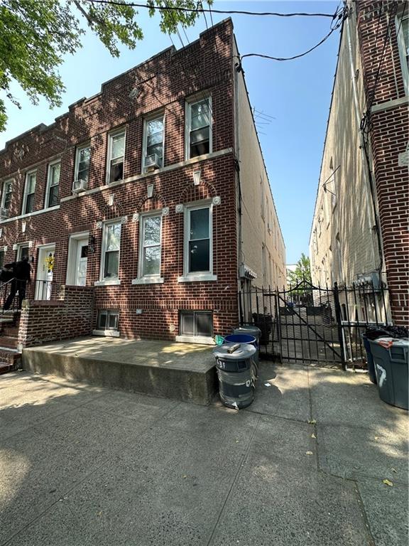 a view of pool with brick walls