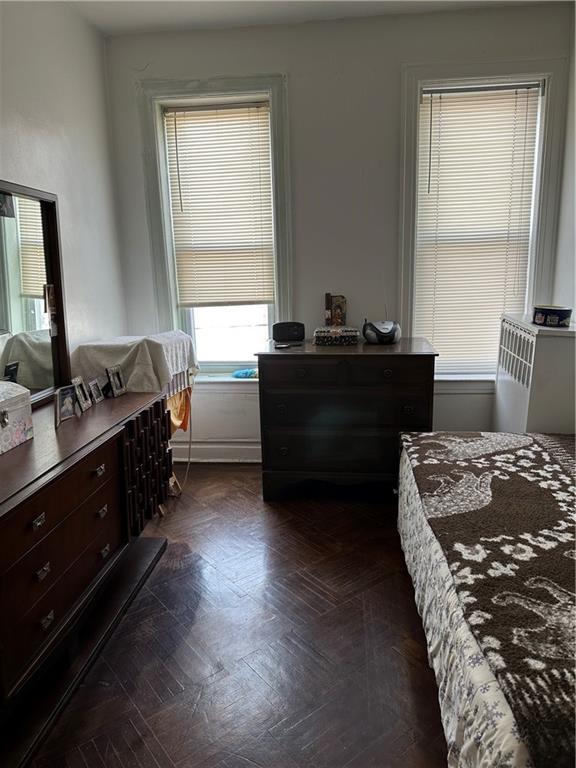 631 Bay Ridge Avenue Brooklyn, NY 11220 - Photo 3 of 9 a bed room with a bed and a window