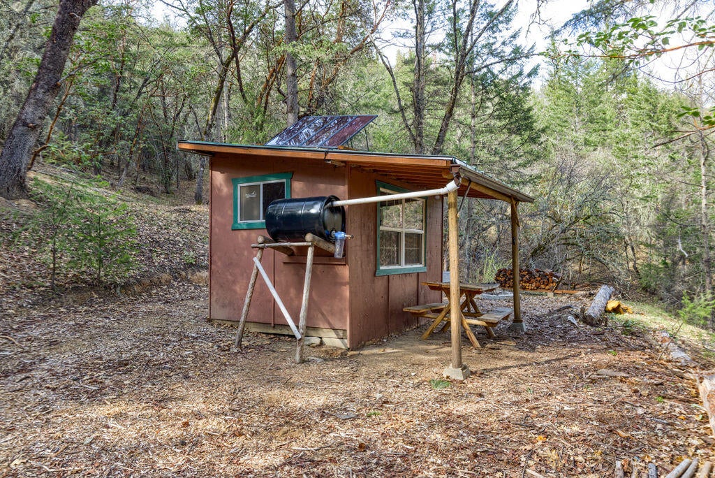 4766 Andrews Road Medford, OR 97501 - Photo 62 of 71 Refurbished hunters cabin with filtered rain water catch system and solar lighting