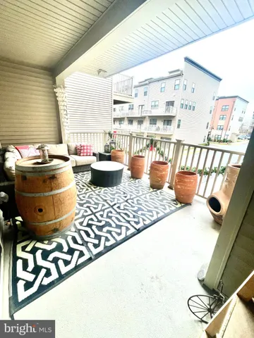 a kitchen with a stove and a white cabinets