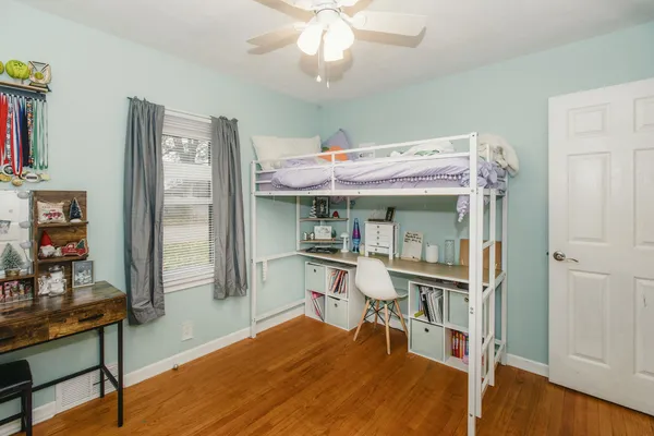 a room with cabinets and flat screen tv
