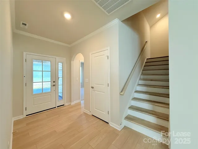 a view of an entryway with staircase