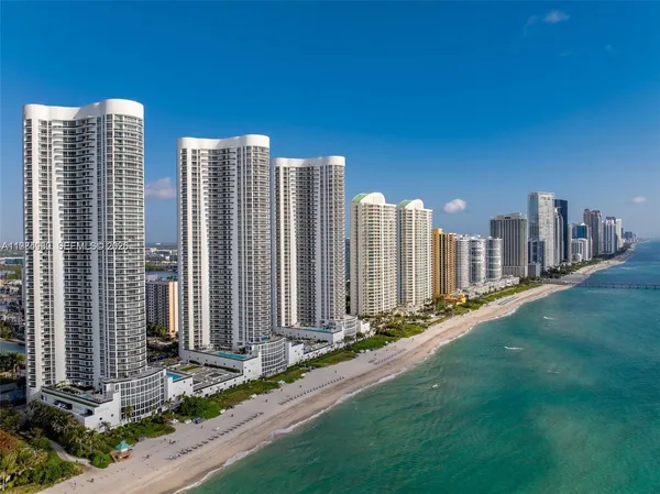 a view of a city with tall buildings