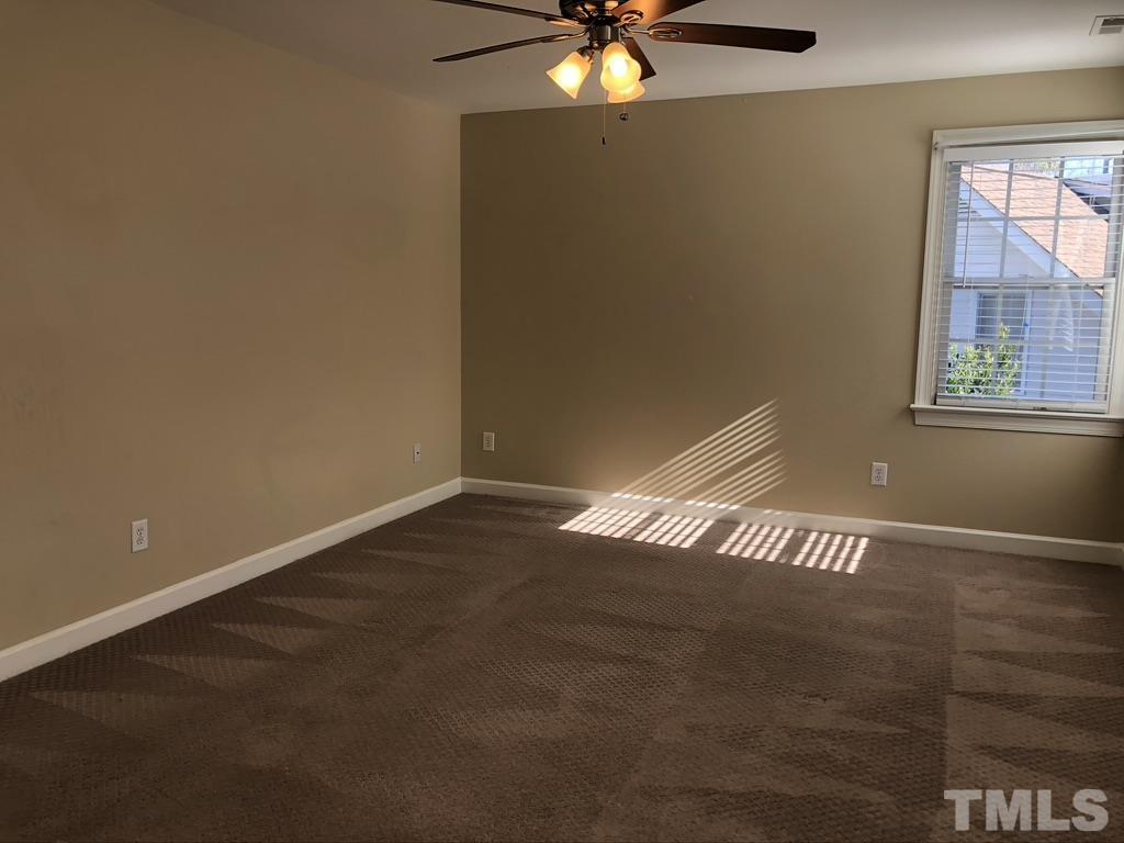 200 Oak Pine Drive Apex, NC 27502 - Photo 16 of 26 an empty room with a window