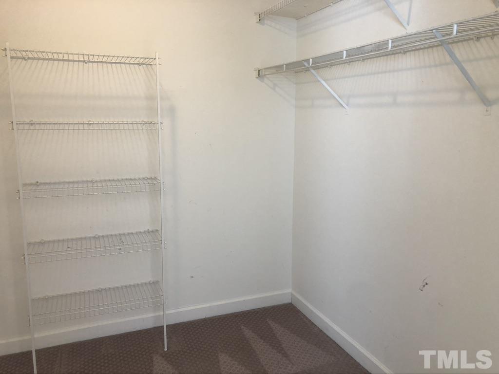 200 Oak Pine Drive Apex, NC 27502 - Photo 20 of 26 a view of an empty walk in closet