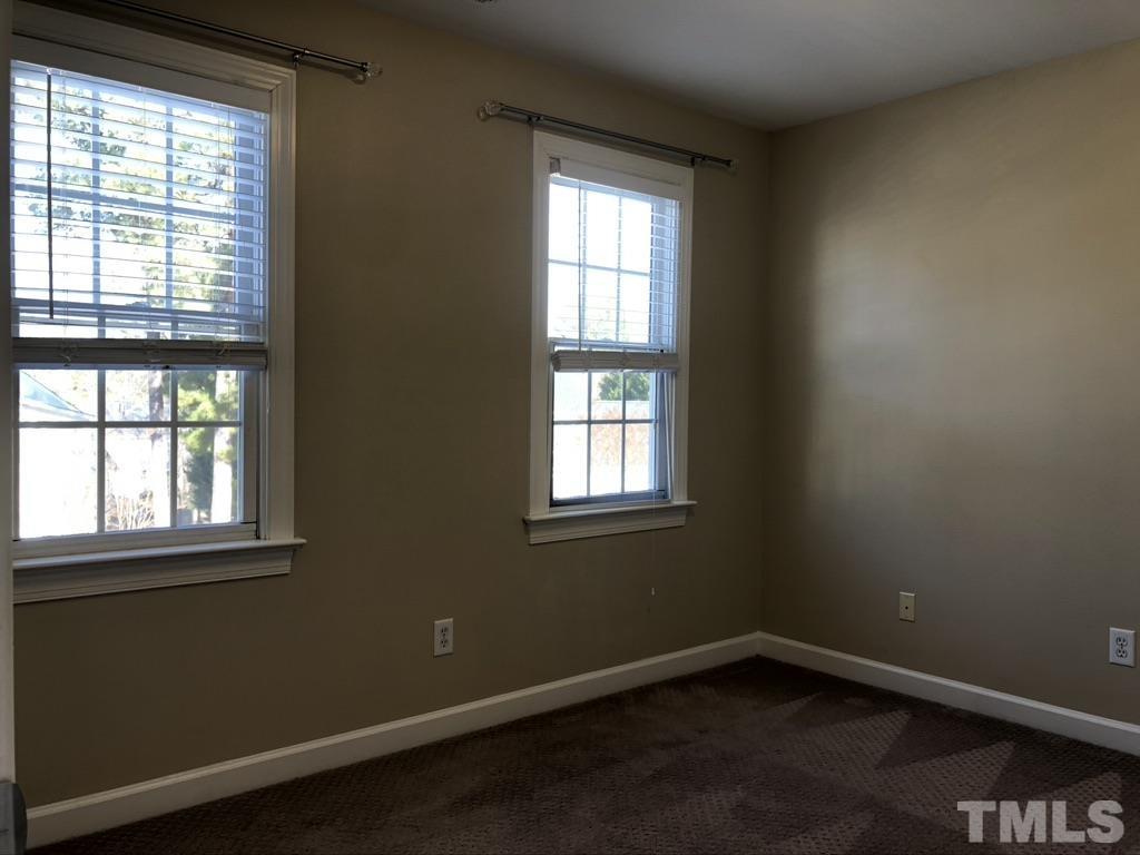 200 Oak Pine Drive Apex, NC 27502 - Photo 24 of 26 an empty room with a window