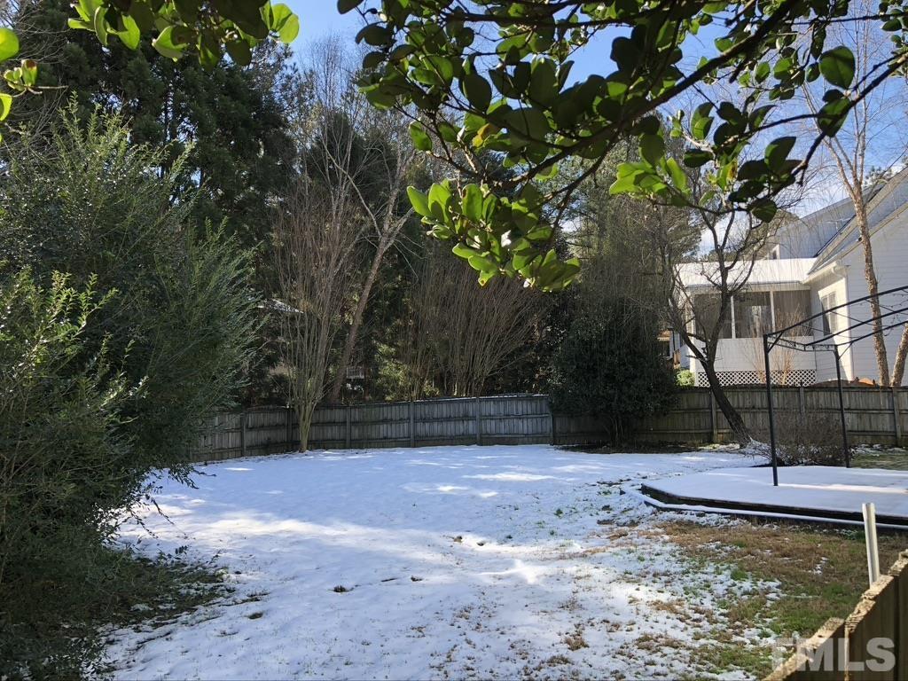 200 Oak Pine Drive Apex, NC 27502 - Photo 4 of 26 a view of a yard with a tree