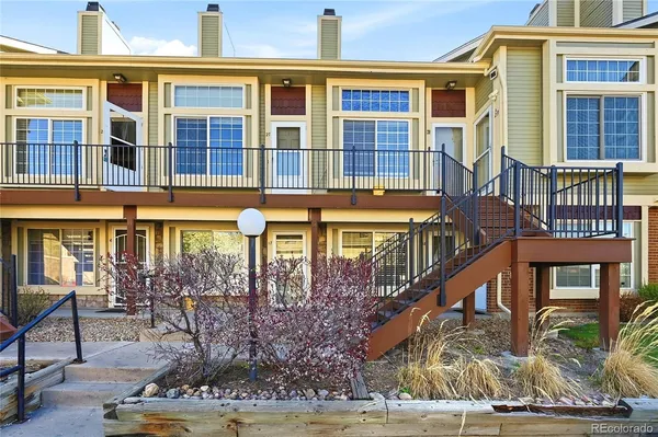 front view of a building with a fountain