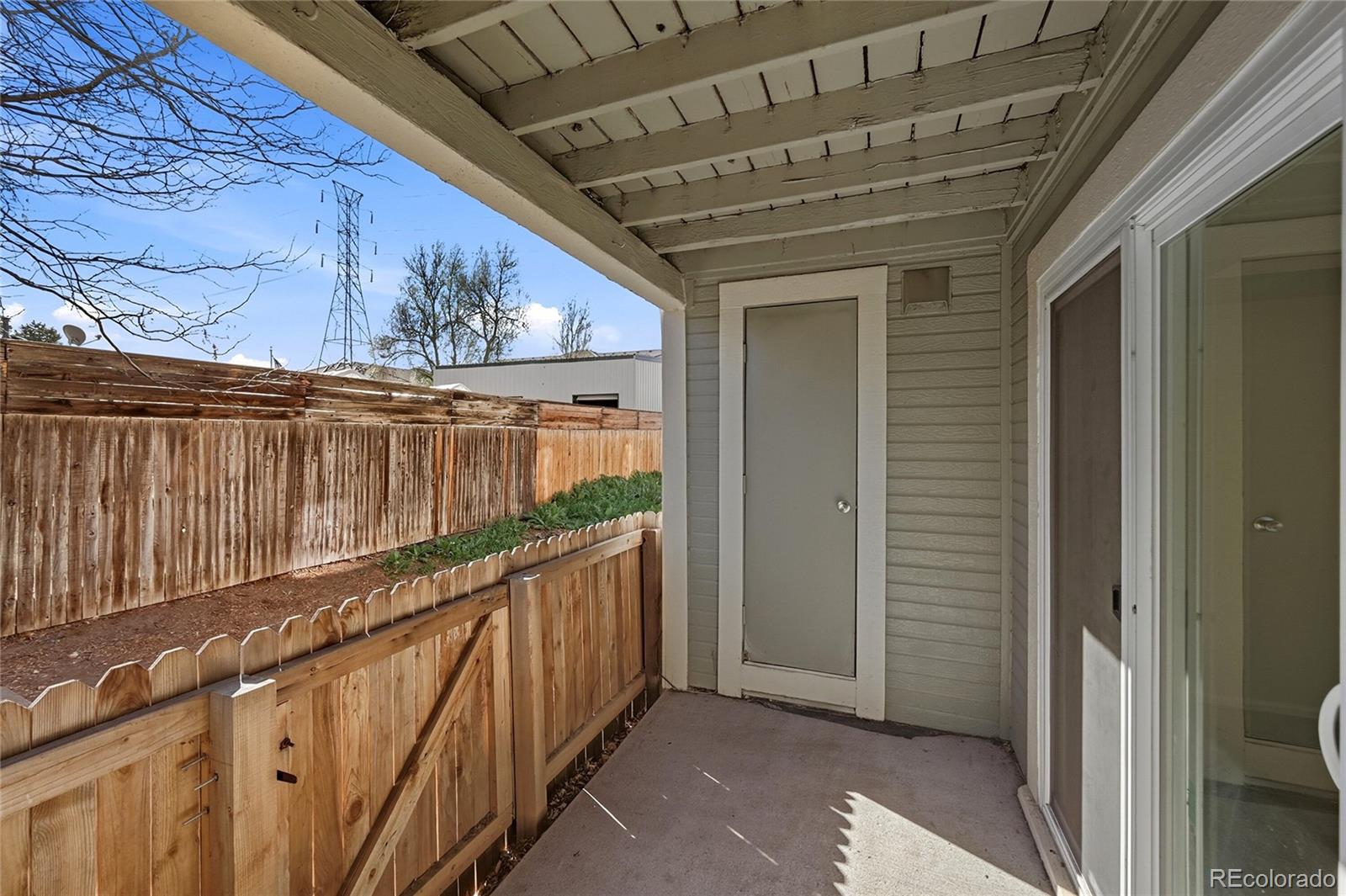 1885 South Quebec Way, Unit A18 Denver, CO 80231 - Photo 17 of 31 a view of a wooden door