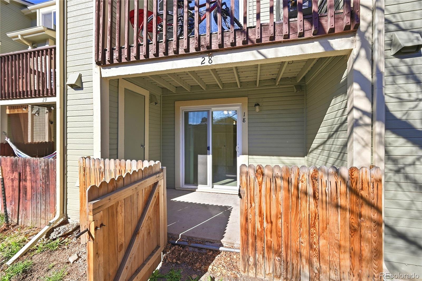 1885 South Quebec Way, Unit A18 Denver, CO 80231 - Photo 18 of 31 a front view of a house