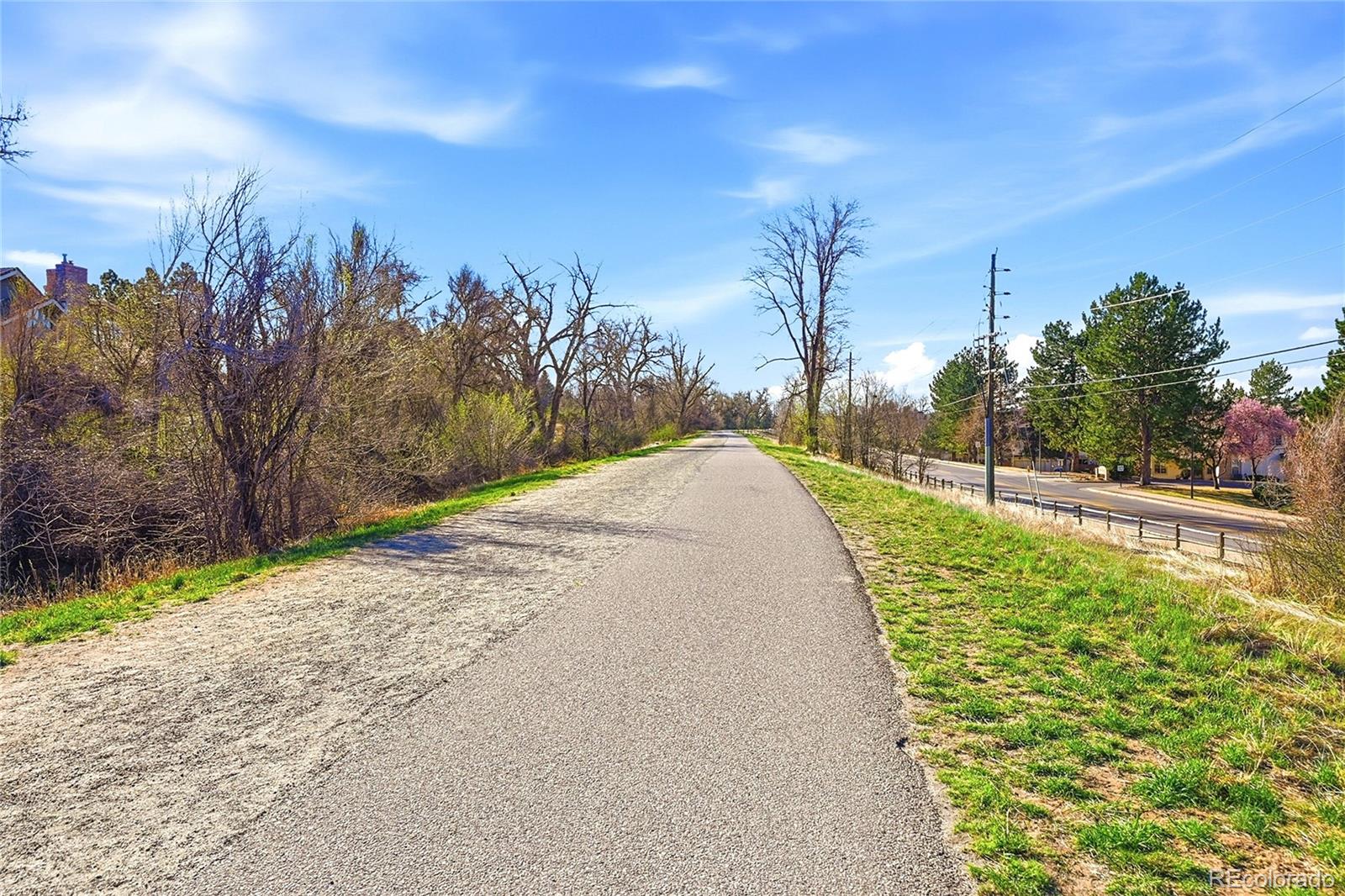1885 South Quebec Way, Unit A18 Denver, CO 80231 - Photo 25 of 31 a view of a pathway with a yard