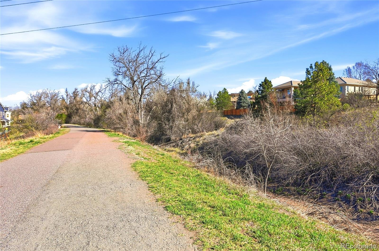1885 South Quebec Way, Unit A18 Denver, CO 80231 - Photo 26 of 31 a view of a pathway with a garden