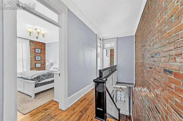 a bathroom with a toilet a sink and shower