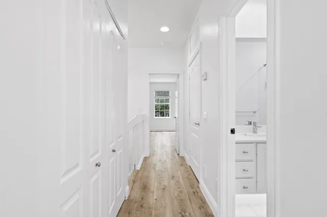 a bathroom with a sink double vanity and a shower